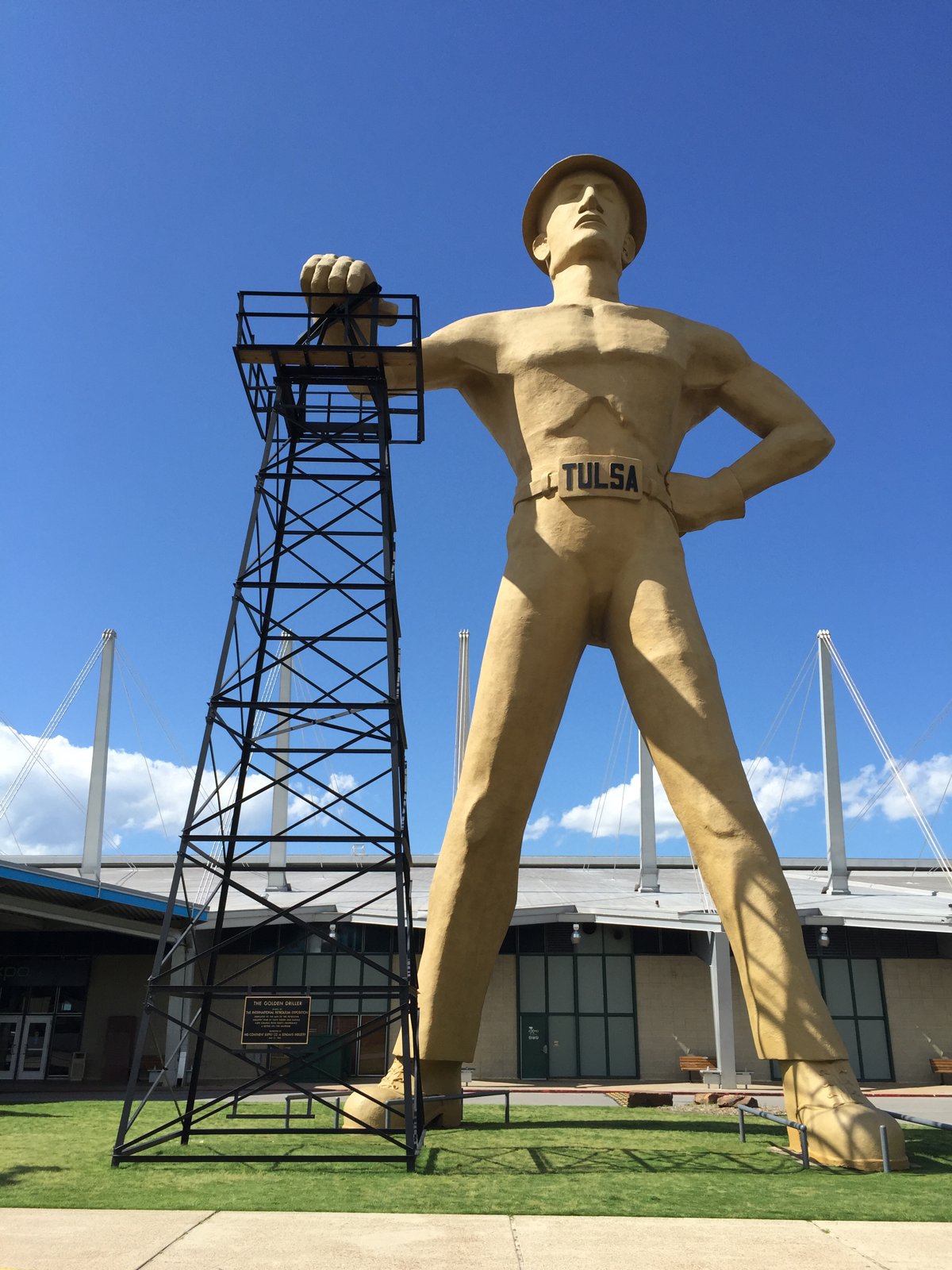 Tulsa's Golden Driller statue beside the oil derrick at Expo Square